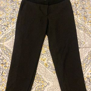 Black and white skinny slacks.